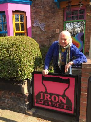 Editor Peter Mortimer. at the gate of the IRON House
